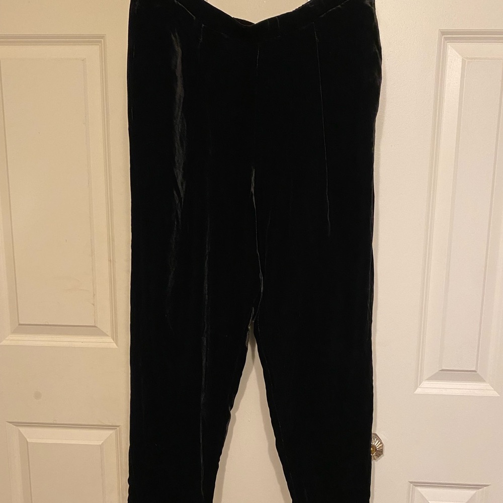 Johnny was black velvet trousers with pockets and elastic waist band